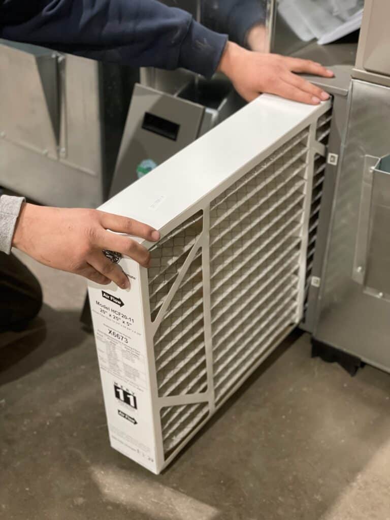 Replacement HVAC air filters ready for installation.