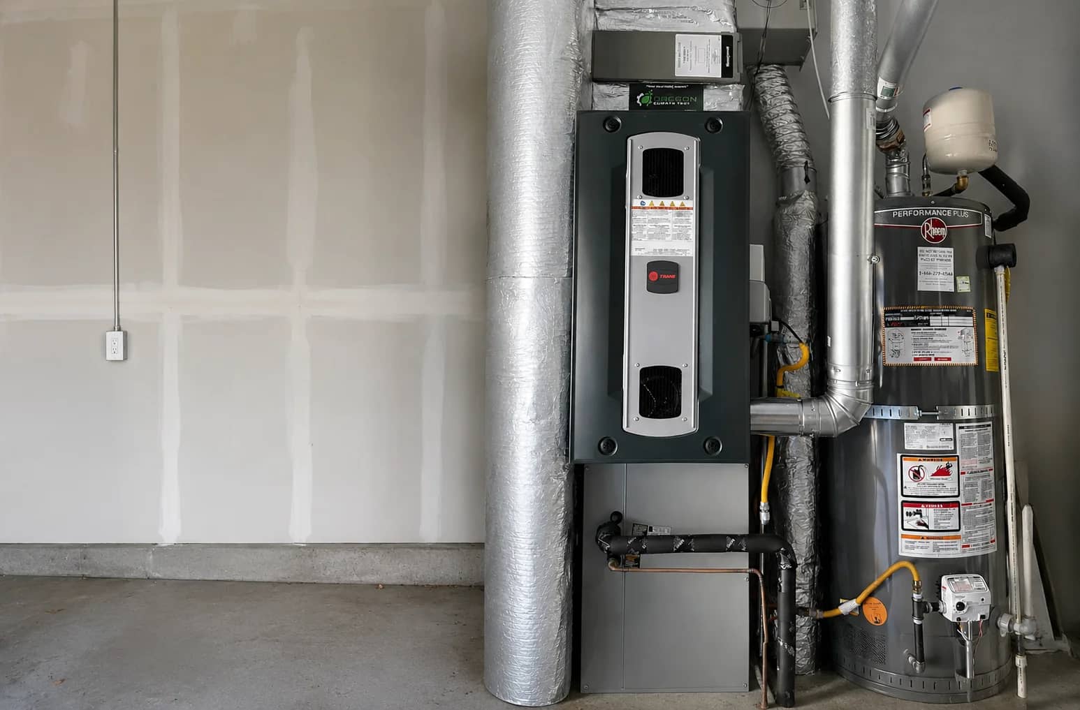 A water heater installed by Durfee in a Cape Cod home mechanical room.