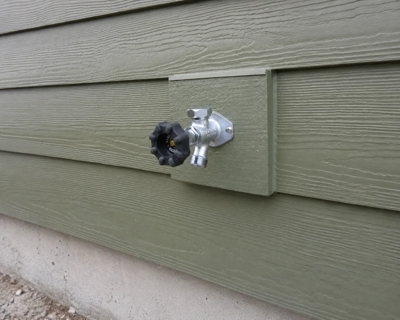 A new frost-free outdoor faucet installed by Durfee Plumbing & Heating on a Cape Cod home.